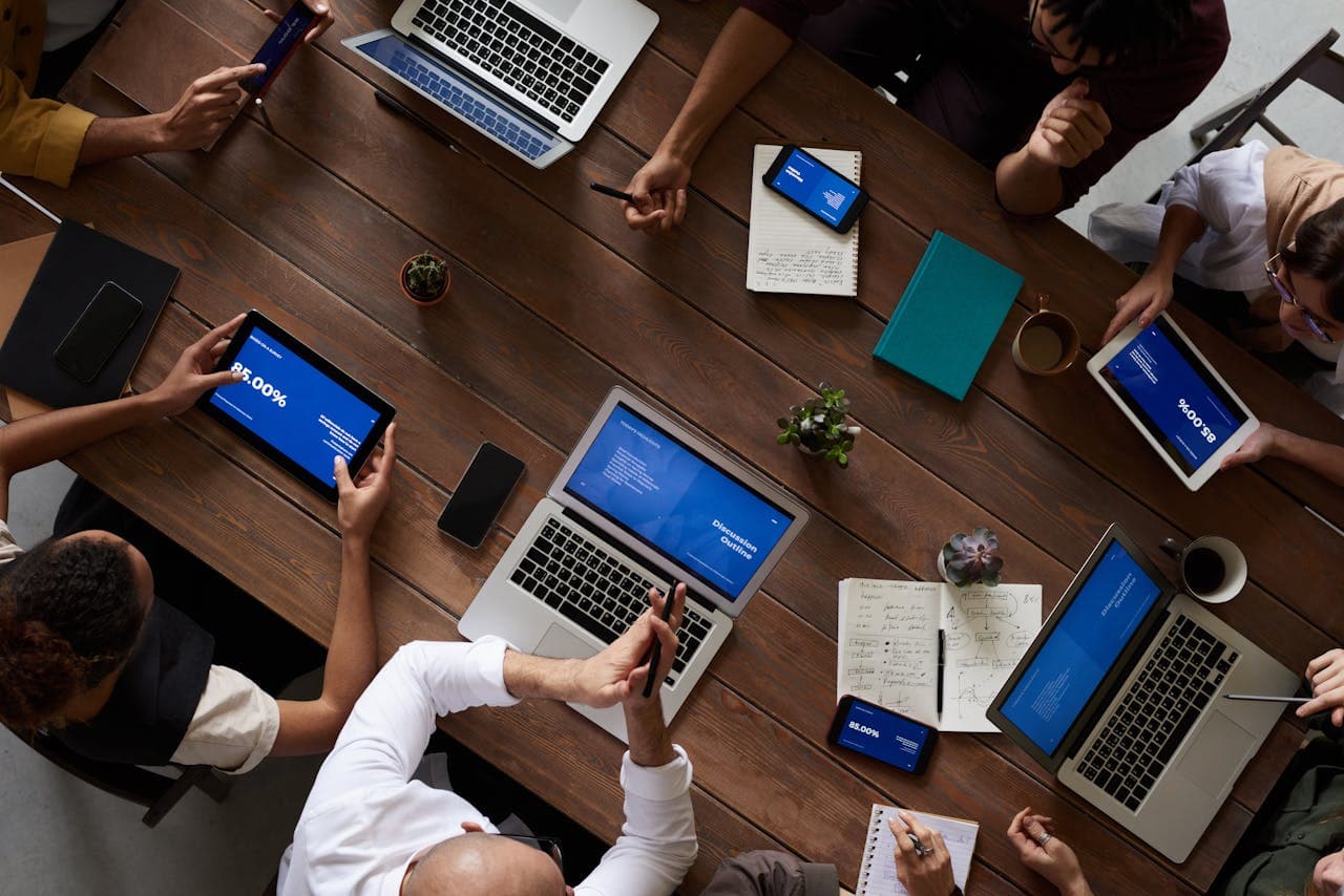 table with laptops